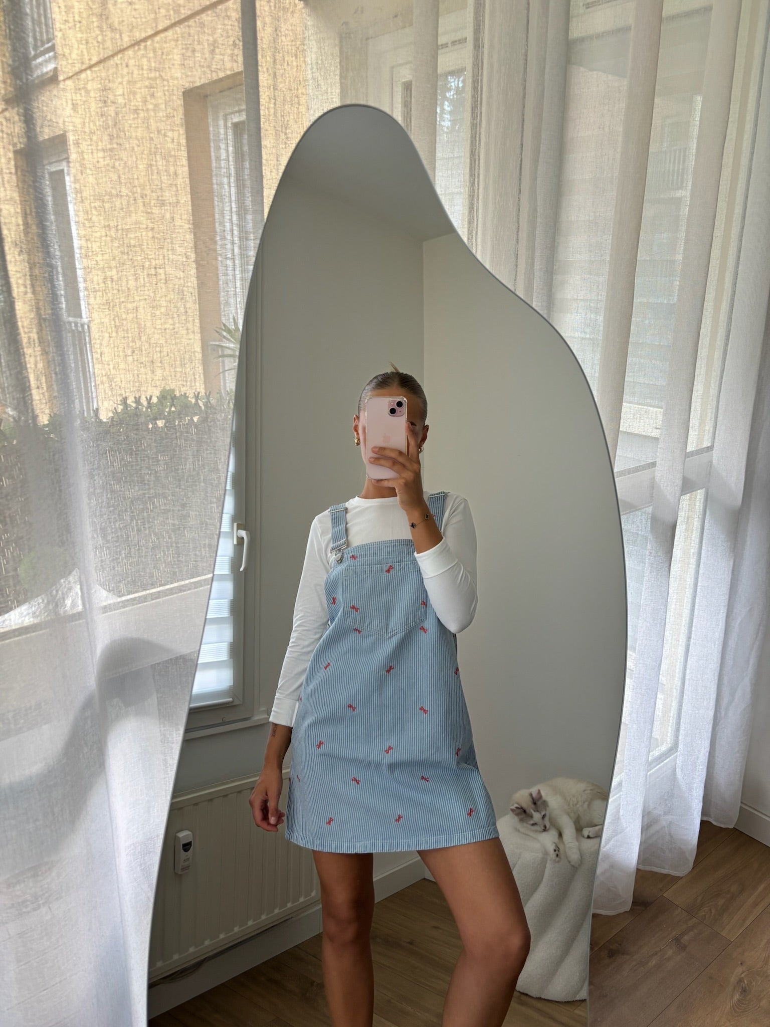 Overalls dress with a bow